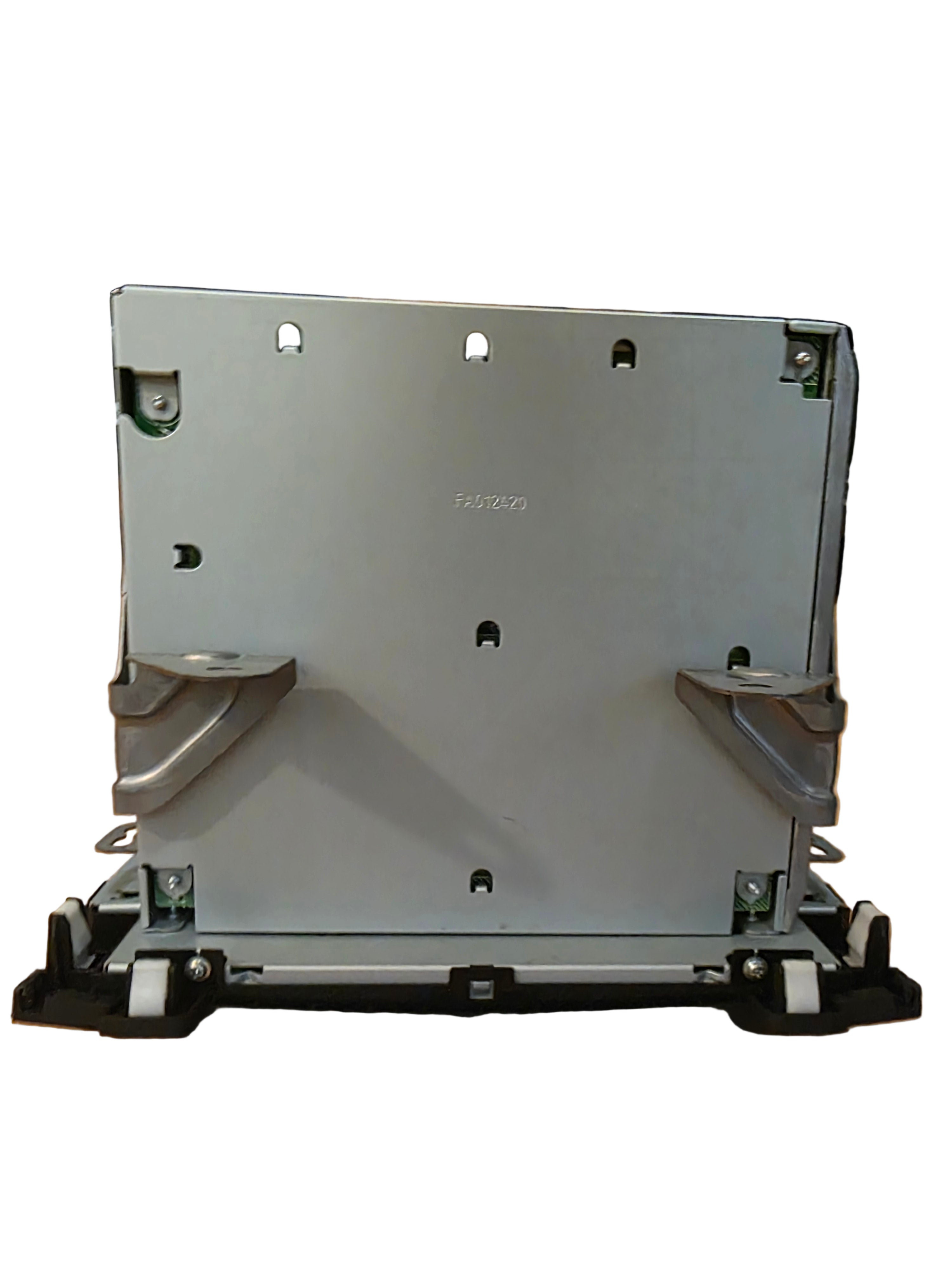 Metallic object on a wooden surface with a blurred background