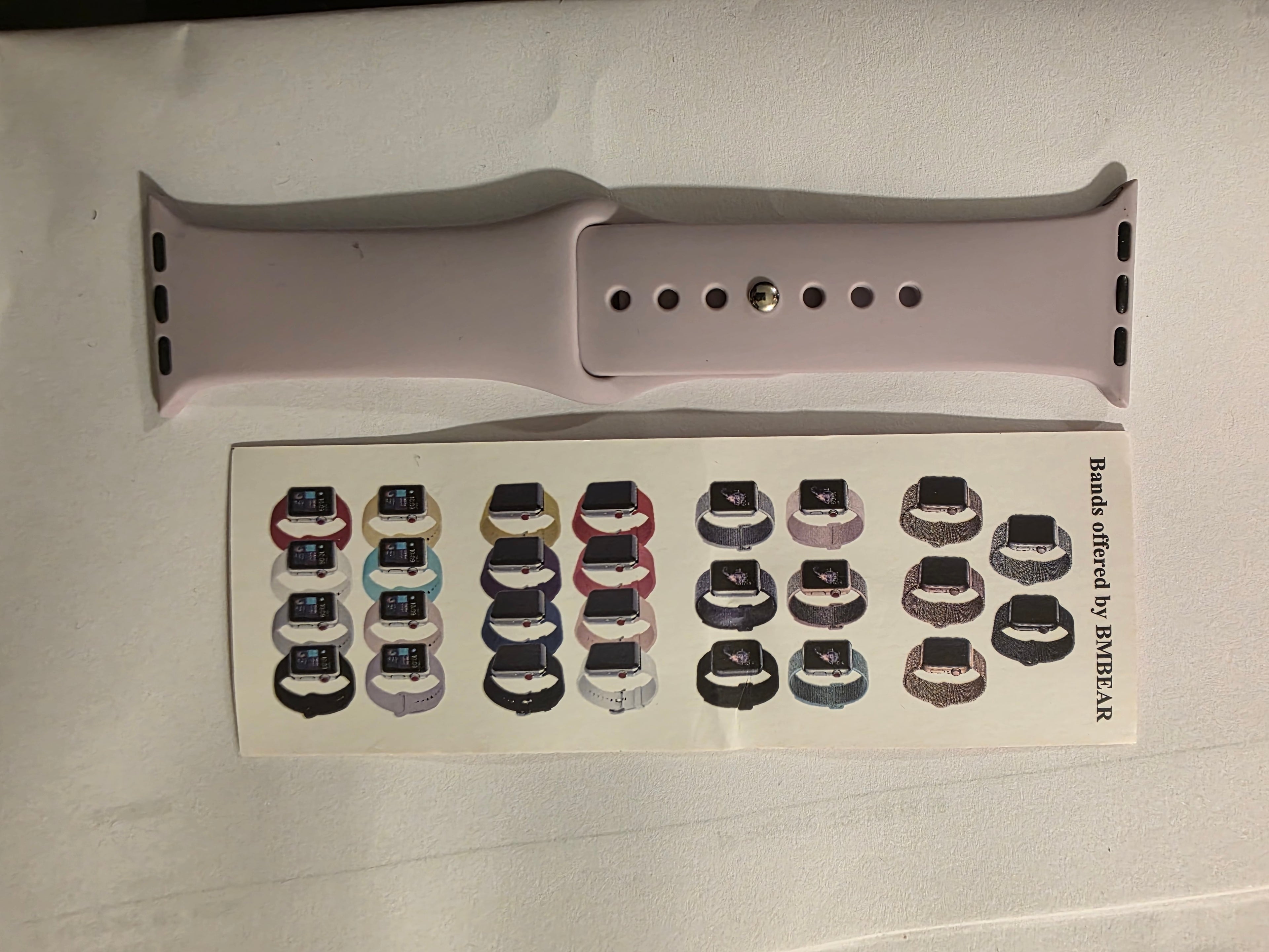 Watch band with a display of various band options on a white background