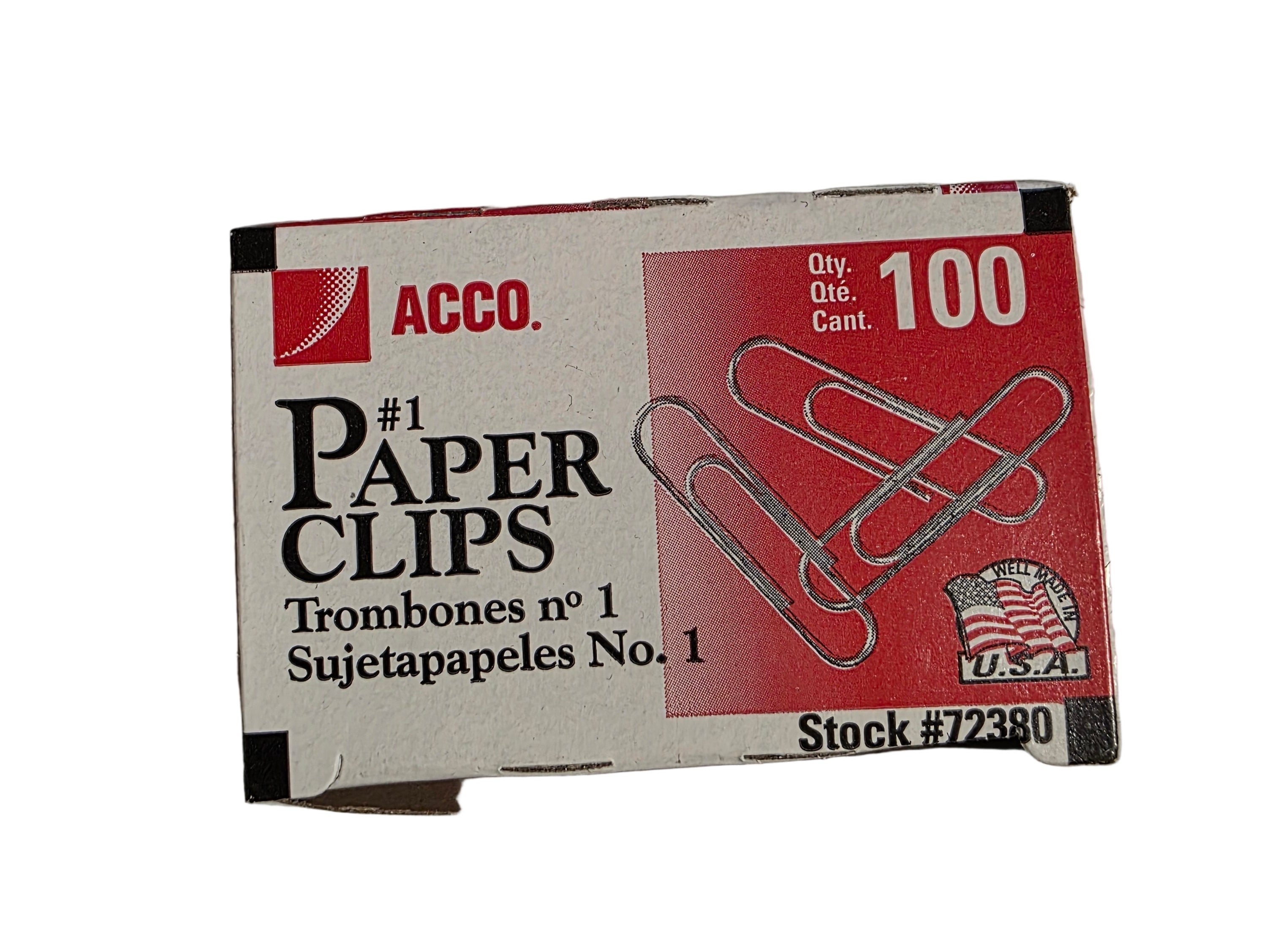 Box of Acco paper clips on a textured surface