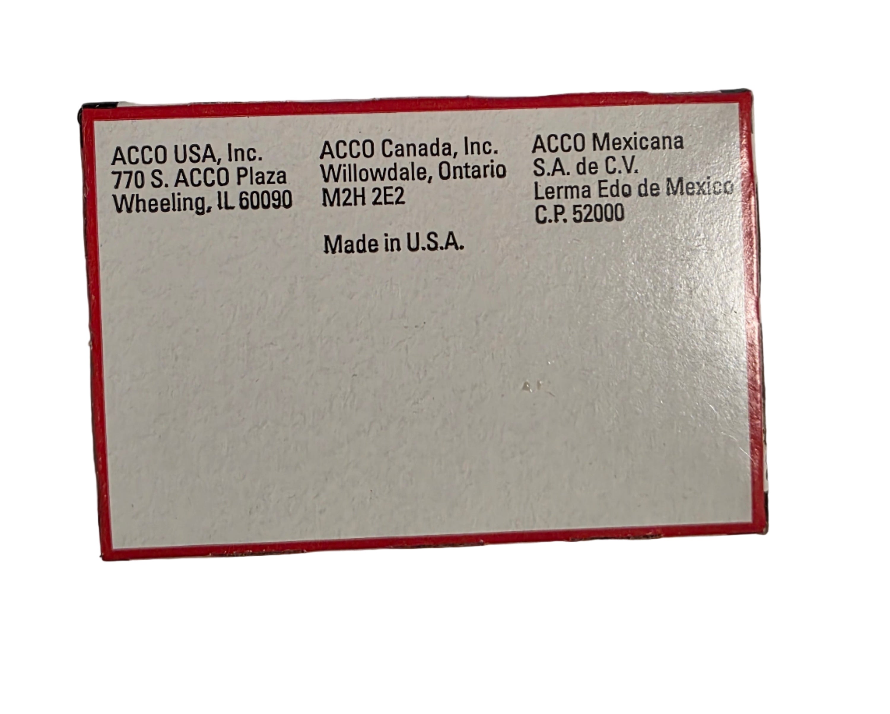 Small rectangular box with text on a textured surface